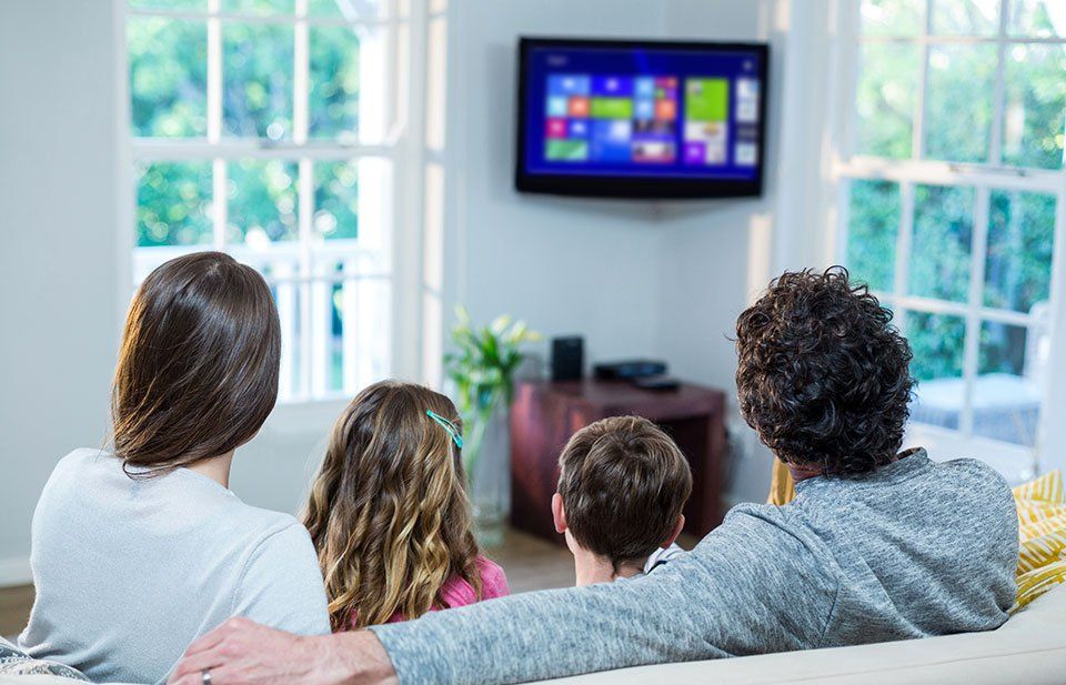 Family watching TV